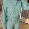 Triple Nine - Blouse basics half moon - Sage green & Triple Nine - Pant flared with gold rib belt - Sage green